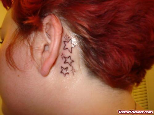 Outline Stars Behind Ear Tattoo