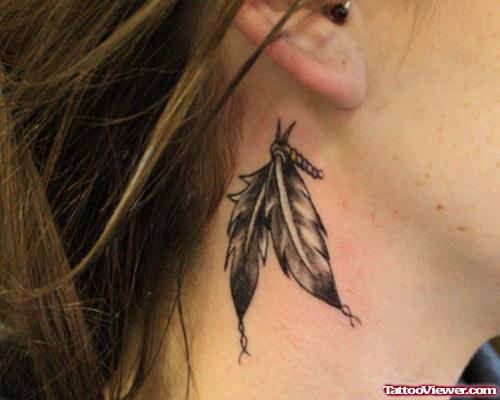 Feathers Ear Tattoo