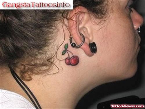 Red cherry Tattoo On Right Ear