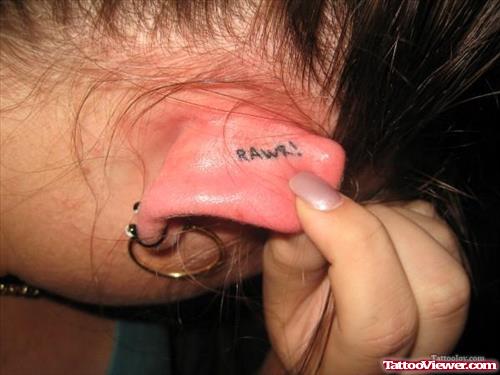 Rawr Behind Ear Tattoo
