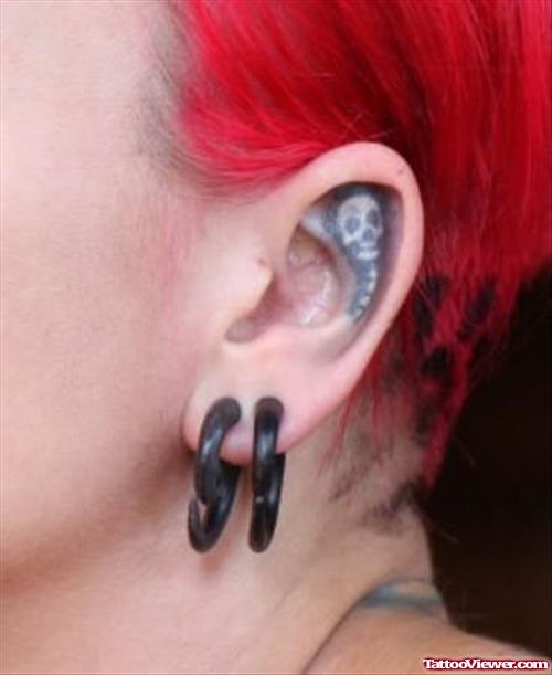 Left Esar Skull Ear Tattoo