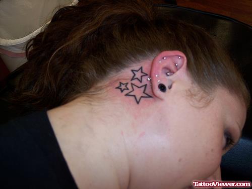Stars Below Ear Tattoo For Girls