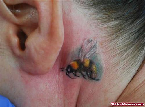 Colored Ink Bumble Bee Ear Tattoo