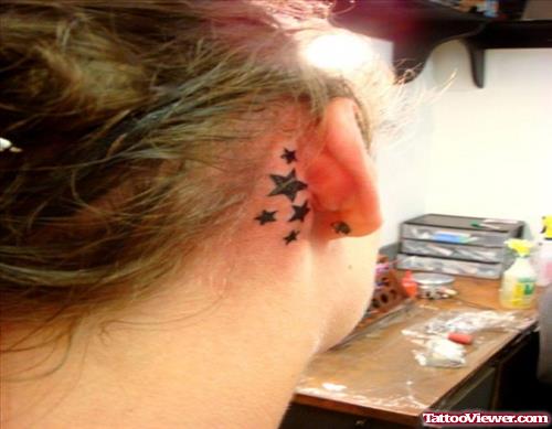 Black Stars Ear Tattoo Behind Ear