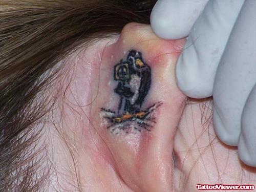 Back Ear Penguine Tattoo