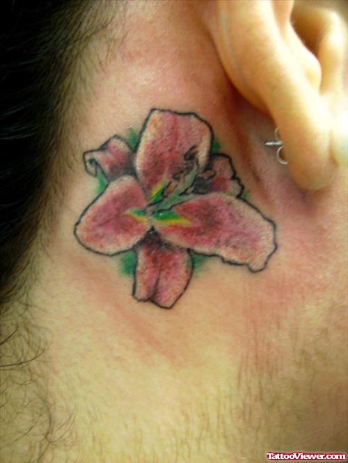 Red Lily Flower Behind Ear Tattoo