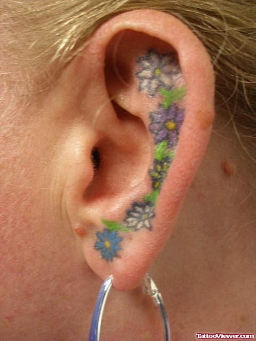 Colored Flowers Ear Tattoo