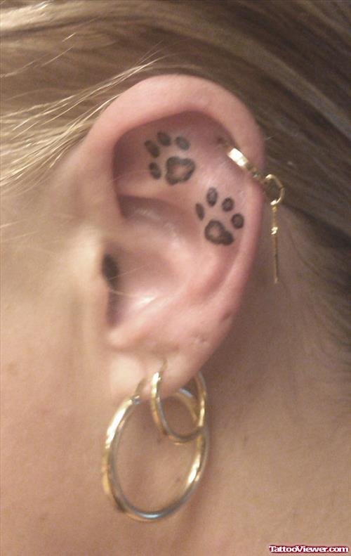 Awesome Paw Prints Left Ear Tattoo