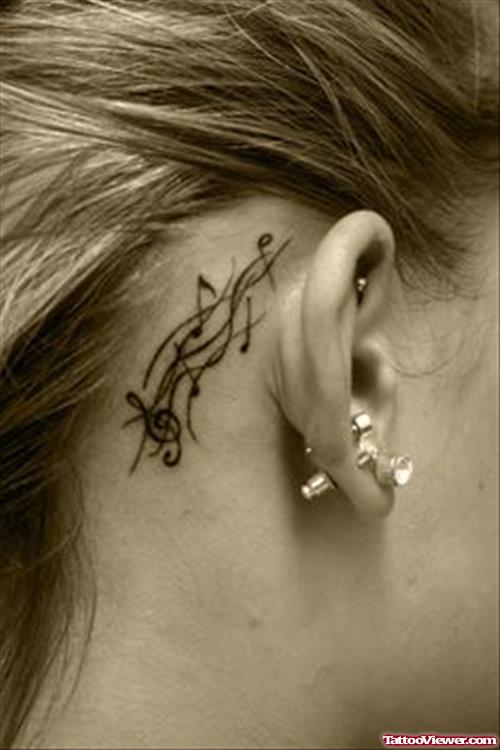 Ear Musical Notes Tattoo