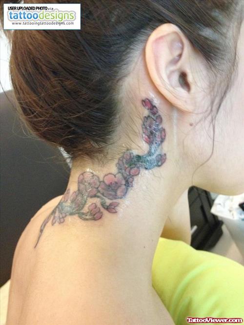 Colored Flowers Tattoos Below Ear