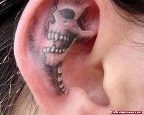 Black Skull Tattoo In Ear