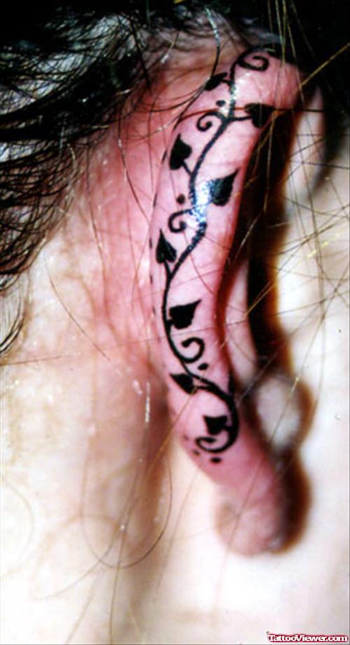 Black Leaves Right Ear Tattoo