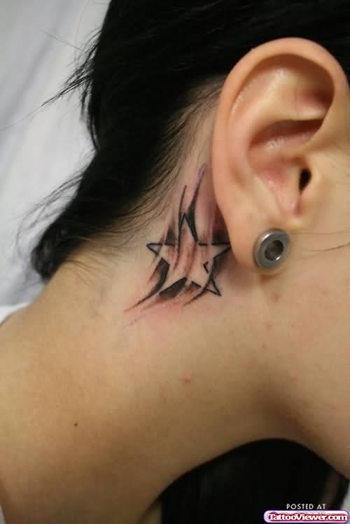 Black Ink Star Tattoo Behind Ear