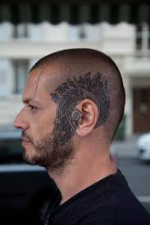 Man With Grey Ink Outside Ear Tattoo