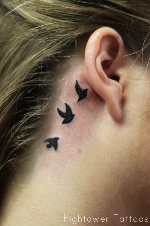 Flying Black Birds Back Ear Tattoo