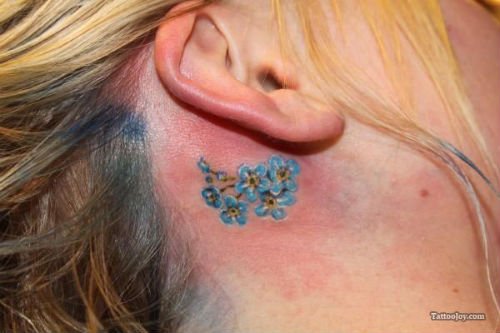 Blue Flowers Below Ear Tattoo