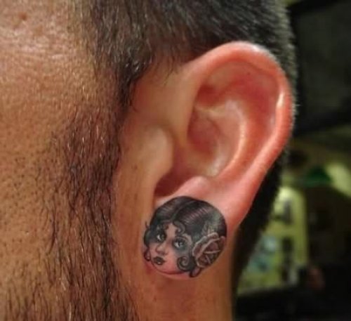 Girl Head Tattoo On Ear