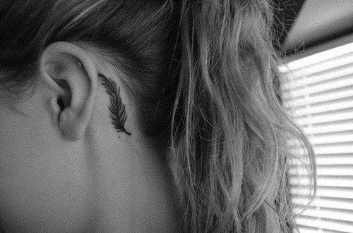 Feather Tattoo On Girl Left Ear