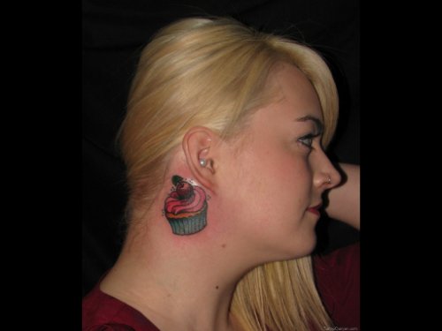 Colored Cupcake And Cherry Ear Tattoo