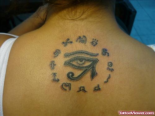 Egyptian Eye And Symbols Tattoo On Upperback
