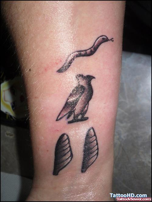 Grey Ink Egyptian Bird And Snake Tattoo