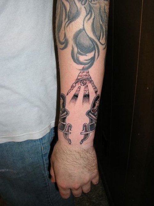 Egyptian Tattoo On Man Left Sleeve