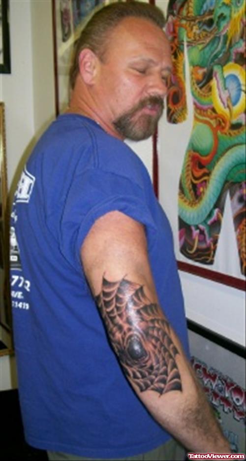 Grey Mandla Flower Elbow Tattoo
