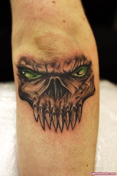 Green Eyes Skull Elbow Tattoo