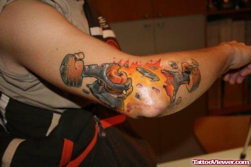 Biomechanical Piston Tattoo On Elbow