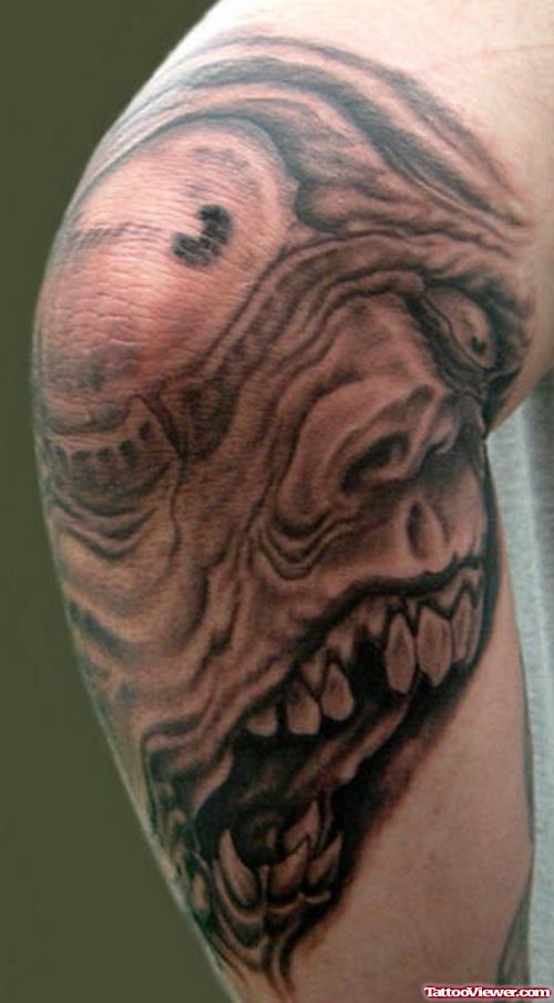 Zombie Face Elbow Tattoo