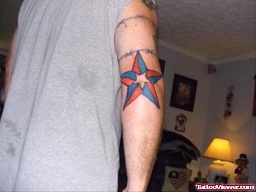 Red And Blue Nautical Stars Elbow Tattoo Design