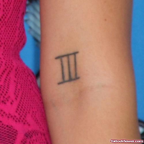 Roman Number Elbow Tattoo