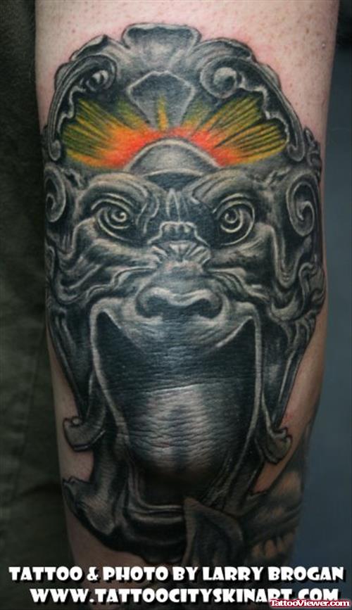 Gargoyle Elbow Tattoo