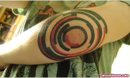 Red And Black Ink Elbow Circles Tattoo