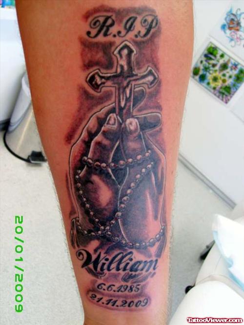 Memorial Rip Cross In Hands Elbow Tattoo