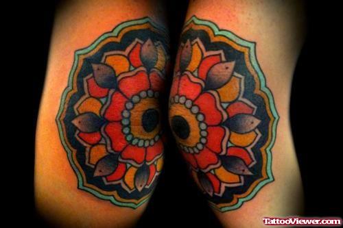 Elbow colored Flowers Tattoos