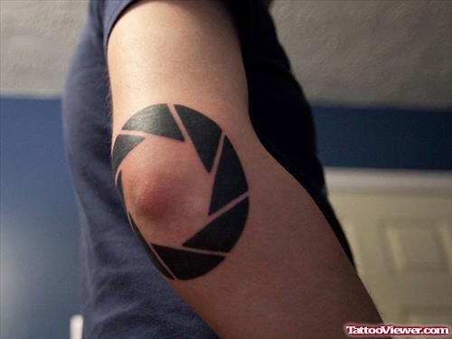 Awesome Black Camera Shutter Elbow Tattoo