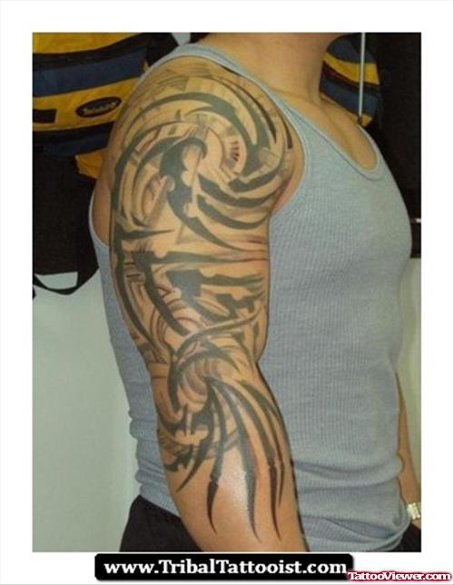 Amazing Black Tribal Elbow Tattoo For Men