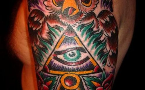 Colored Owl And Eye Elbow Tattoo