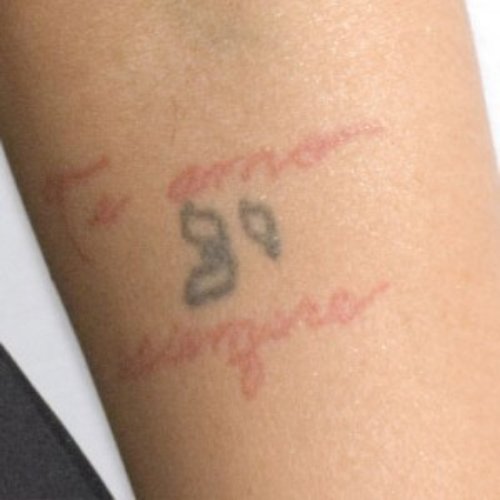 Christina Aguilera Hebrew Elbow Tattoo