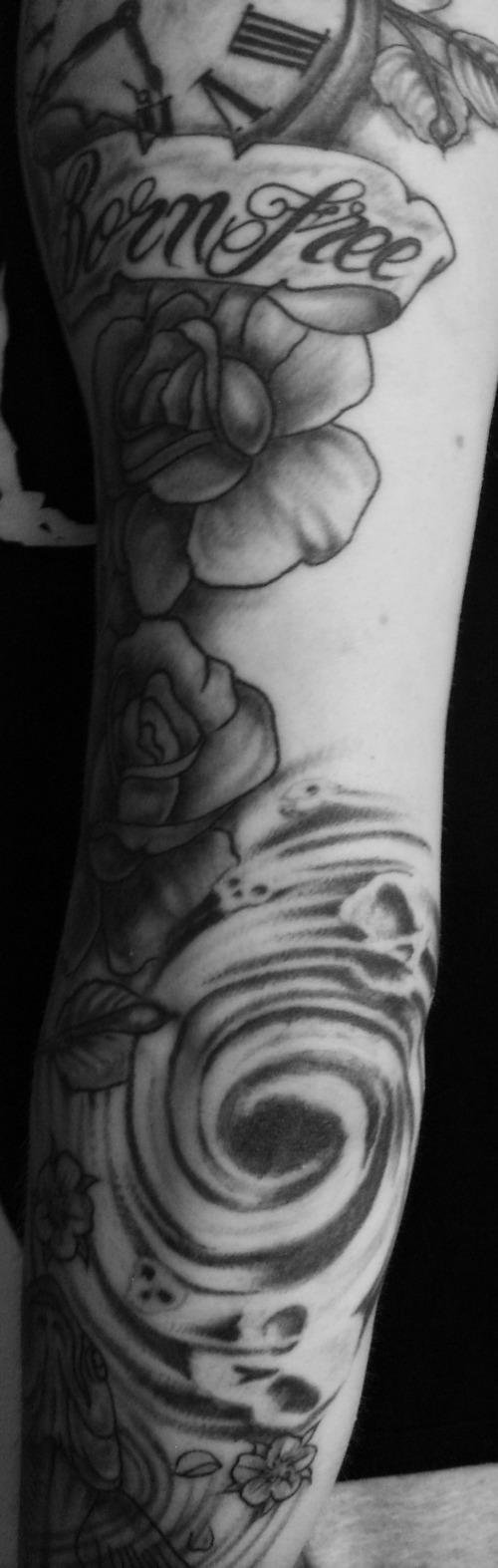 Flowers And Spiral Elbow Tattoo