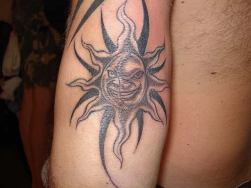 Grey Tribal Sun Elbow Tattoo