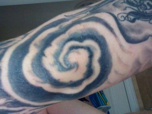 Grey Spiral Clouds Elbow Tattoo
