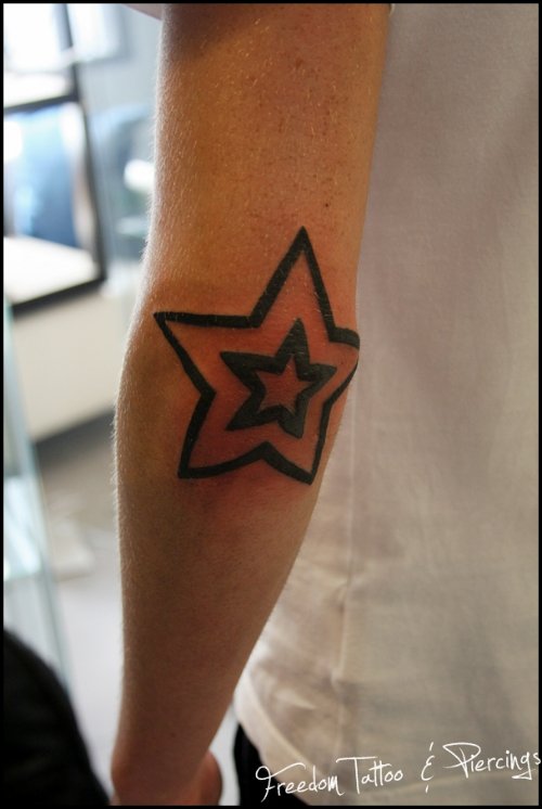 Black Stars Elbow Tattoo