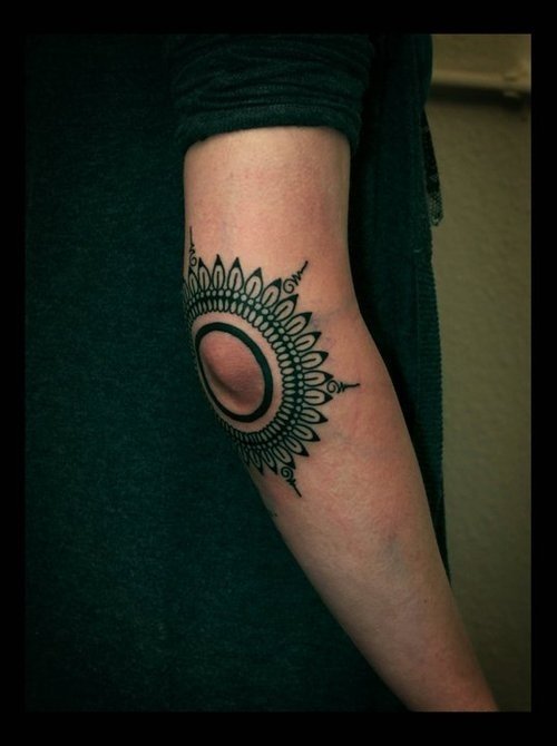 Roung Flower Right Elbow Tattoo