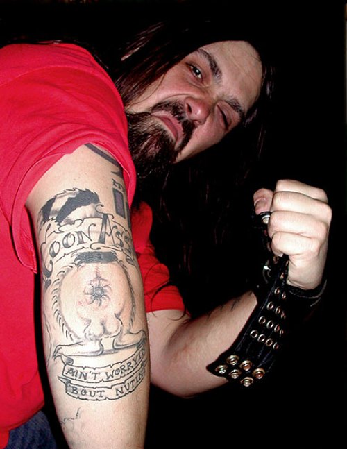 Coon Ass Elbow Tattoo For Men
