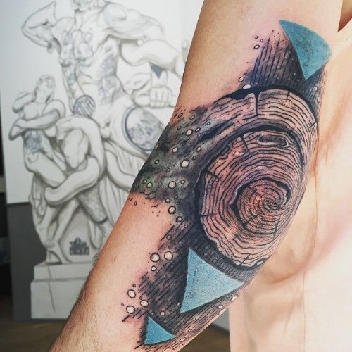 Spiral Elbow Tattoo On Sleeve