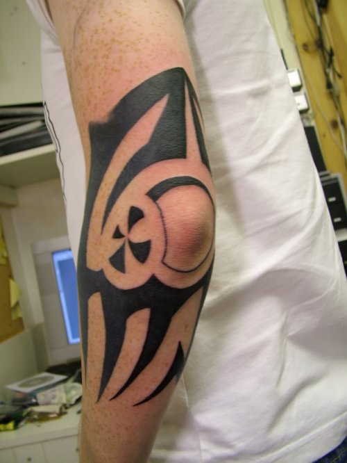 Black Tribal Tattoo On Left Elbow