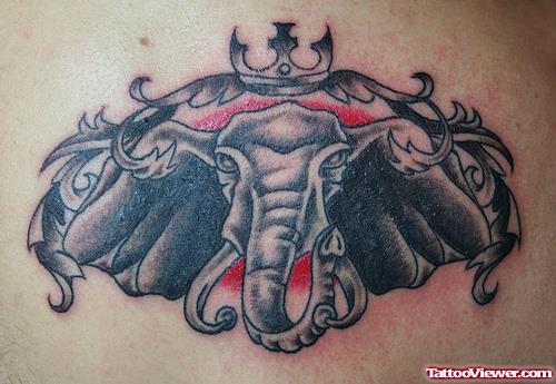 Swirl And Elephant Head Tattoo