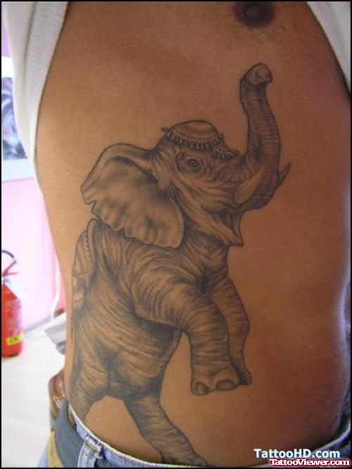 Jumping Elephant Tattoo On Rib Side